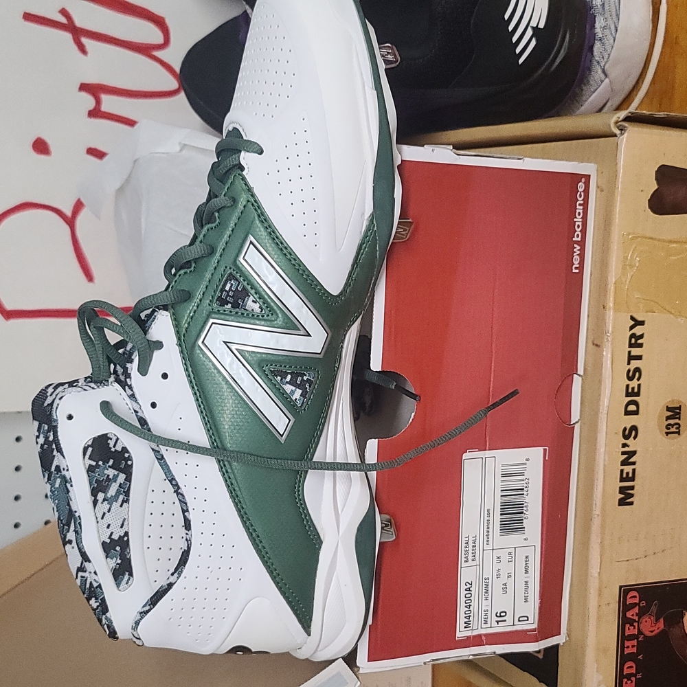 Brand new New Balance metal baseball cleats